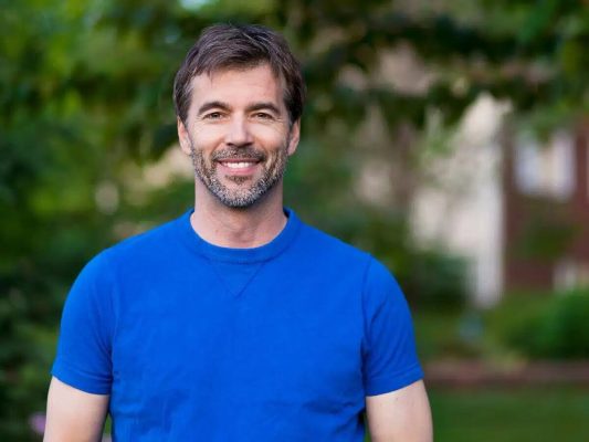 Picture of a man wearing blue shirt